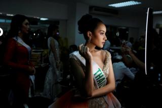 Kanwara Kaewjin prepares backstage at the Miss International Queen 2019 transgender beauty pageant