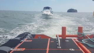 Boat being pulled to safety