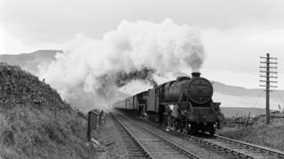 Class 5 locomotive with a passenger train at Ais Gill on the Settle to Carlisle line, 1955