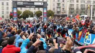 Riders set off from the start during the Men's Elite Road Race from Leeds to Harrogate