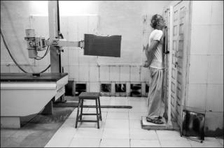 A patient has an x-ray taken at the Shakir Ali Khan hospital