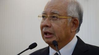 Malaysia's Prime Minister Najib Razak delivers a statement in Kuala Lumpur on August 6, 2015.