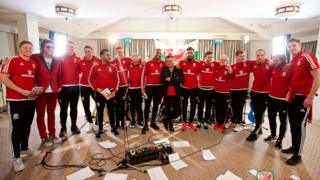 The Wales team with James Dean Bradfield from the Manic Street Preachers