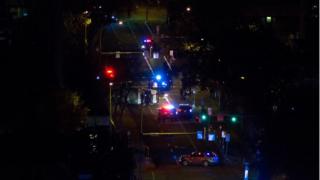 Aerial image of cordoned off scene where van overturned on Jasper avenue