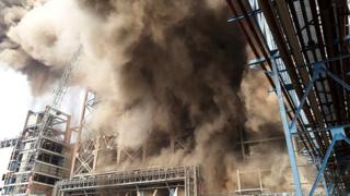Smoke billows from a coal-fired power plant after a boiler unit exploded in the town of Unchahar in the northern Indian state of Uttar Pradesh on 1 November 2017.