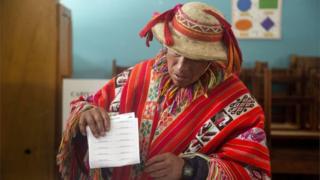 A man casts his vote in Cuzco. Peru.