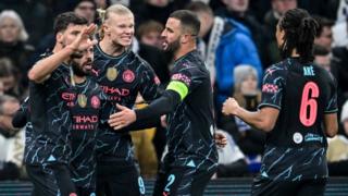 Manchester City players celebrate scoring against FC Copenhagen