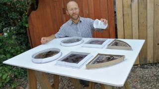 Daniel Roberts creating the poo-filled windows
