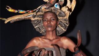 Lilian Ericaah Maraule, Miss Tanzania 2017 prepares backstage in her National Costume at Planet Hollywood Resort ^ Casino on November 18, 2017. The National Costume Show is an international tradition where contestants display an authentic costume of choice that best represents the culture of their home country. The Miss Universe contestants are touring, filming, rehearsing and preparing to compete for the Miss Universe crown in Las Vegas, Nevada.