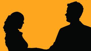 Man and woman at distance