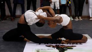 Ifeoma Amazobi, 22, and her colleague perform contortions at a show called Limberness in Lagos, Nigeria, on 1 February 2020
