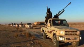 ISIL / ISIS militants on a vehicle driving in Niveneh province, Iraq, June 11 2014