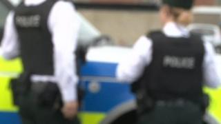 The 48-year-old is being held on suspicion of possession of Class B drugs, and being concerned in the supply of Class A drugs