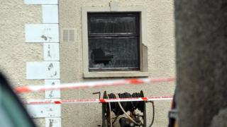 A broken window at the house in which David Murphy was shot dead