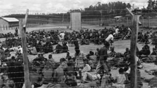 Suspected Mau Mau activists in a prison camp
