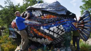 A Fish on display made completely out of plastic gathered from beaches