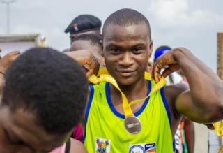 Man receiving medal