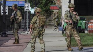 Wisconsin National Guard stand outside the Kenosha County courthouse before the arrival of US President Donald J. Trump in Kenosha, Wisconsin, USA, 01 September 2020