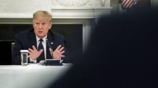 US President Donald Trump speaks during a roundtable in the State Dining Room