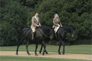 Queen Elizabeth II riding in the grounds of Windsor Castle with US President Ronald Reagan, during his state visit to the UK, 8 June 1982