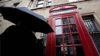 A British Telecoms public telephone box is pictured in central London