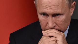 путін