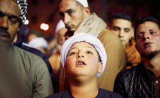 Egyptian Sufi Muslims practice ritualized Zikr (invocation) as they celebrate Moulid Al-Hussein, the birthday of Prophet Mohammad"s grandson Hussein, outside the Al-Hussein mosque in old Cairo, Egypt January 16, 2018.