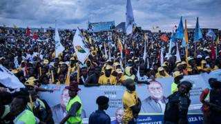 A crowd of supporters stands in front of the stage during an election rally of the presidential candidate Emmanuel Ramazany Shadary