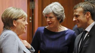 Angela Merkel with Theresa May and Emmanuel Macron