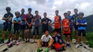 A Facebook photo shows the coach with some of the missing children