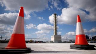 The new remote control tower is seen between traffic cones at London City Airport, Britain