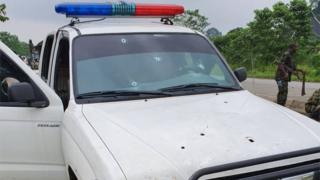 Vehicle with bullet holes