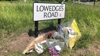 Floral tributes have been left on Lowedges Road