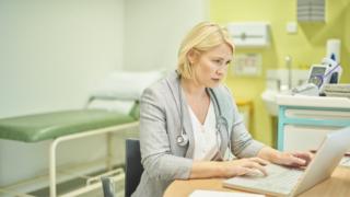 A doctor in his office