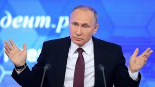 путін