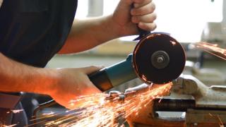 Man using grinder