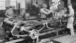 Workers at a General Motors factory in the UK in circa 1920