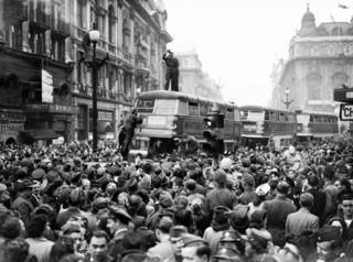 Crowds celebrating VE Day in Piccadilly Circus