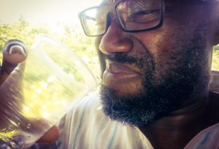 Nick Davis drinks rum