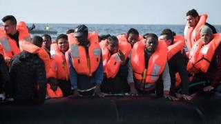 Migrants on rubber boat