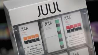 Electronic cigarettes and pods by Juul, the nation's largest maker of vaping products, are offered for sale