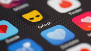 The "Grindr" app logo is seen amongst other dating apps on a mobile phone screen on November 24, 2016 in London, England.