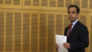 King Juan Carlos University president Javier Ramos preparing to speak to the media