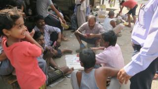 People inside the Tahirpur colony