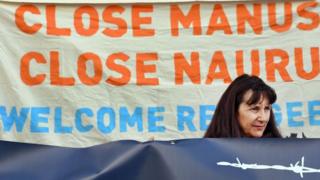 A woman protests against Australia's offshore detention centres for asylum seekers