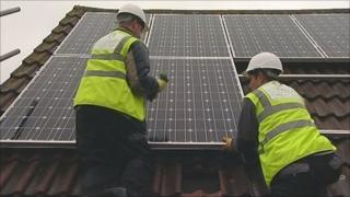 Installing solar panels on a roof