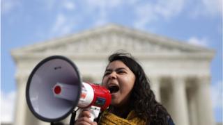 DACA student Anahi Figueroa Flores, who attends Georgetown University, speaks during a rally defending Deferred Action for Childhood Arrivals (DACA) in front of the US Supreme Court