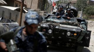 Police in armoured vehicle - 27 May