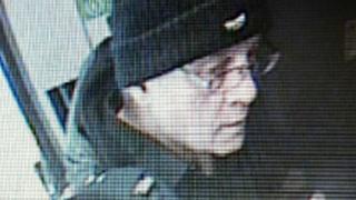 John Clifford spotted on CCTV boarding a train in Belfast