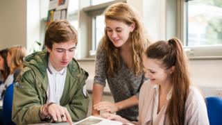 Art history students with books